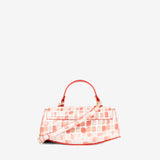 A structured handbag with a curved flap, featuring a red and white crocodile-embossed pattern, a bright red top handle, and a small gold-tone logo clasp at the center #color_red