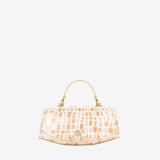 A structured handbag with a glossy crocodile-embossed texture in pale beige and cream, featuring a curved top handle and a small gold-tone logo clasp on the front, set against a plain light gray background #color_beige