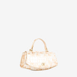 A light beige crocodile-embossed leather handbag with a top handle and gold-tone hardware, photographed against a solid white background #color_beige