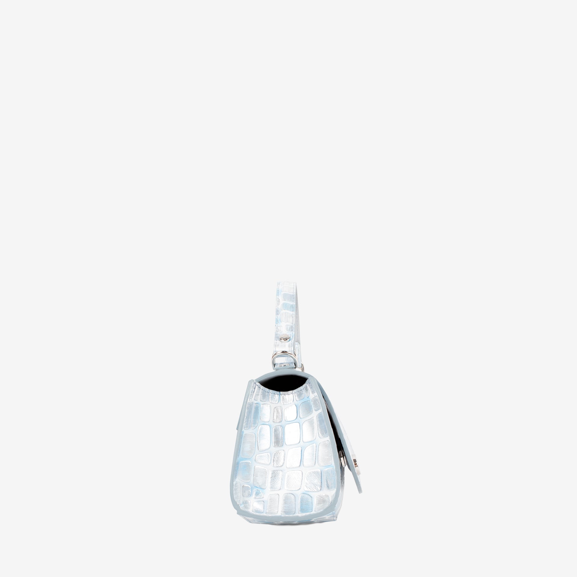 A small structured handbag in a glossy, iridescent light blue crocodile-embossed material, shown from a side profile against a solid white background. #color_lightblue