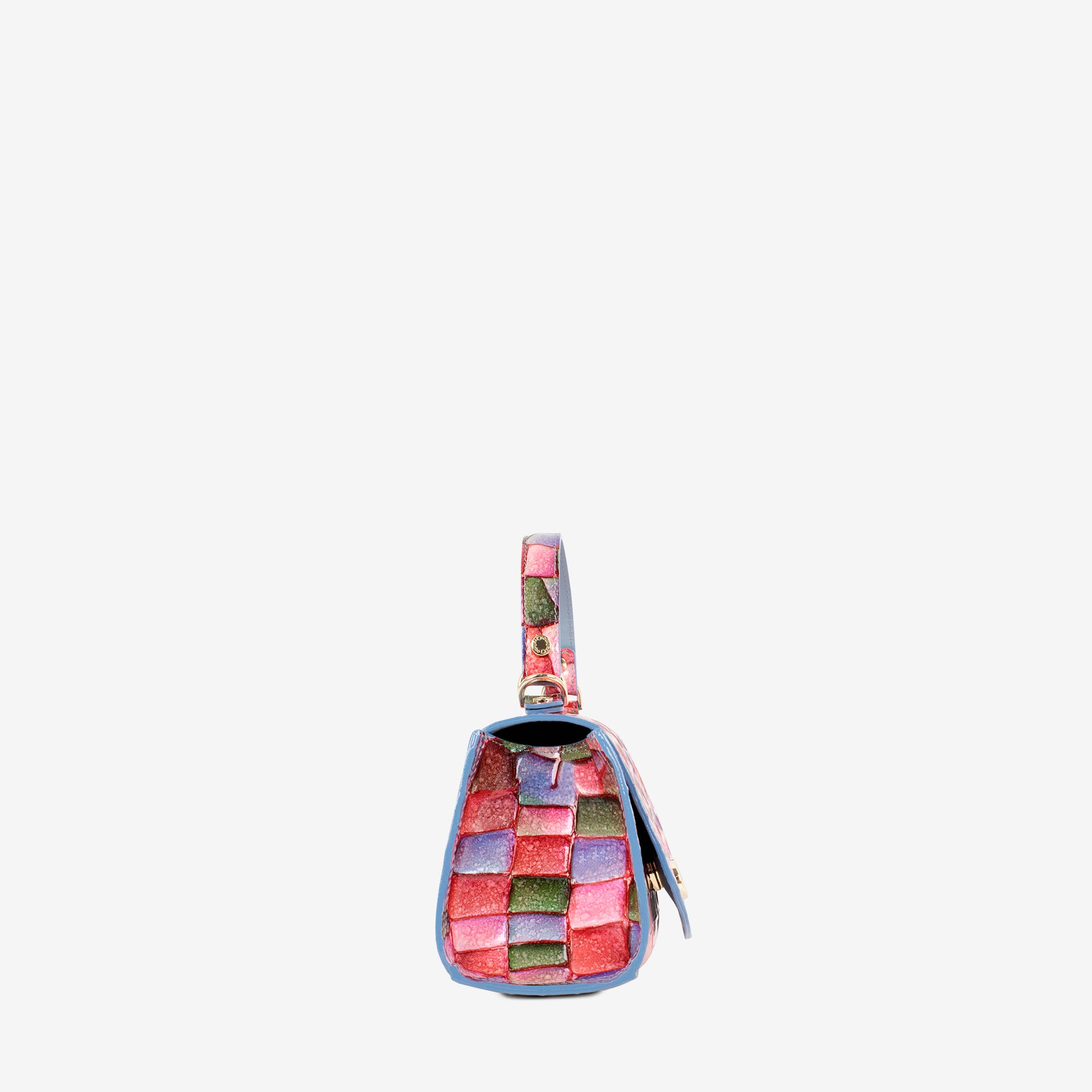 A small woven leather shoulder bag with a multicolor checkered pattern of pink, red, green, and blue squares, featuring a matching woven strap and a blue leather trim, shown against a plain light gray background. #color_pink