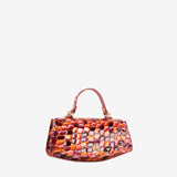A structured handbag with a glossy, textured scale pattern in shades of orange, red, and purple, featuring a top handle and gold-tone hardware, set against a plain light gray background. #color_orange