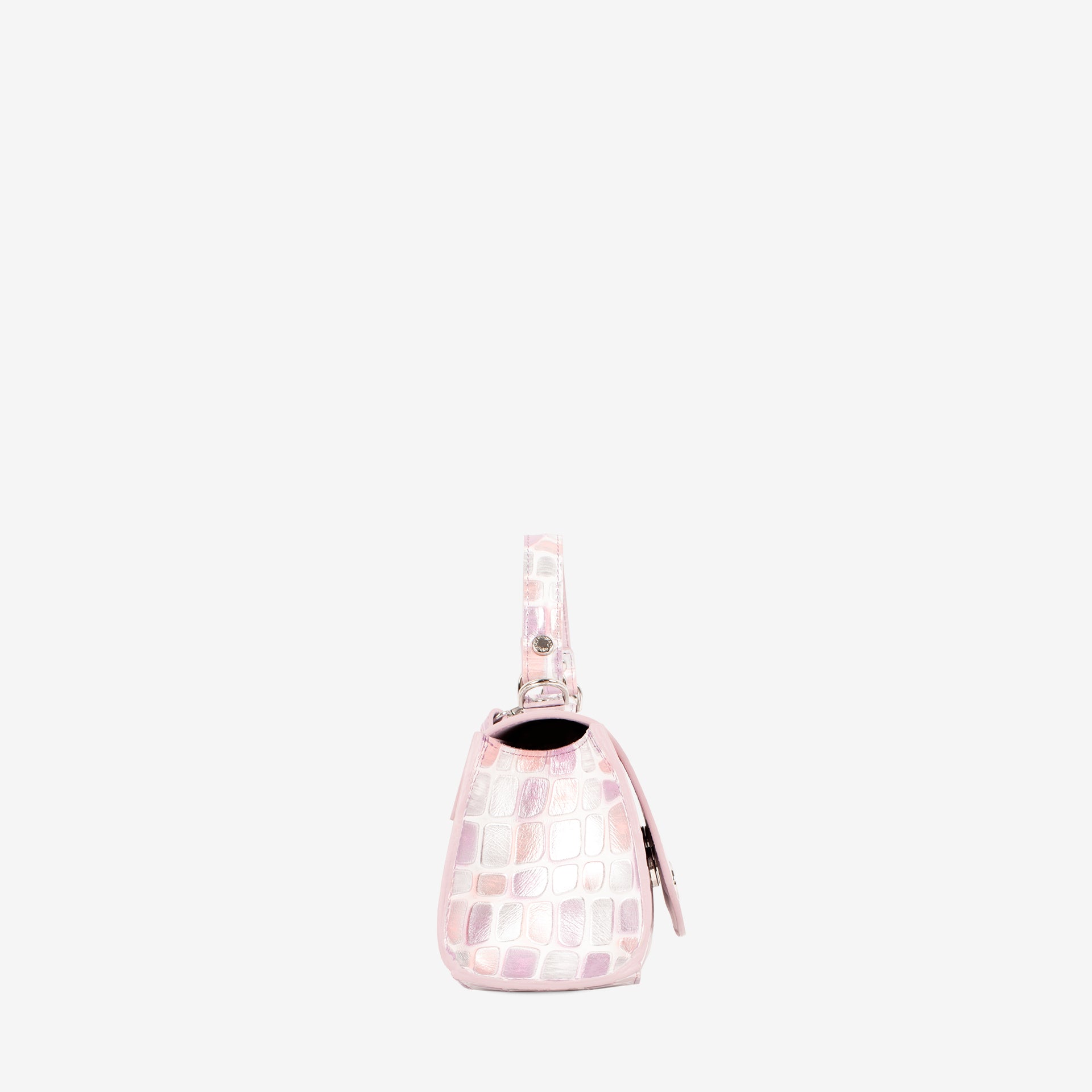 A small light pink crocodile-embossed handbag with a matching strap and silver-tone hardware, shown against a plain white background. #color_lilac