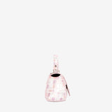 A small light pink crocodile-embossed handbag with a matching strap and silver-tone hardware, shown against a plain white background. #color_lilac