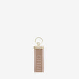 Only By Cavalinho Keychain with textured strap and gold ring #color_beige