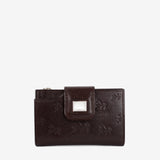 A dark brown leather wallet with an embossed horse pattern and a silver-tone metal accent on the front flap, shown against a plain light gray background SKU 28090232.02 #color_brown