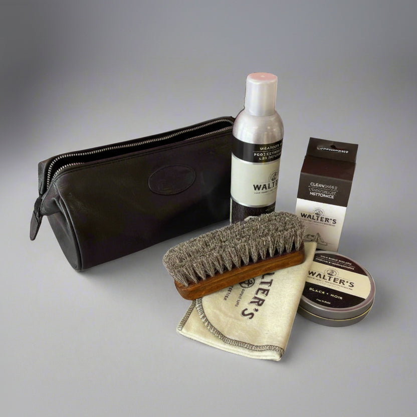 Walters' Gentlemen Leather Care Kit products, including a brush, cleaners, and pouch #color_black